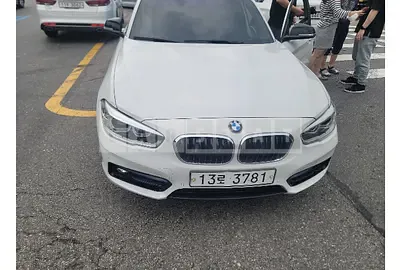 Photo 1 of 27: 2017 BMW 118d, VIN WBA1S5102H5D28755 — Korean insurance auction