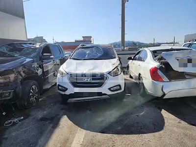 Photo 1 of 14: 2014 Hyundai Tucson, VIN KMHJT81VBFU980423 — Korean insurance auction