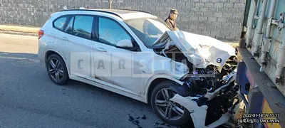 Photo 1 of 12: 2022 BMW X1 xDrive 20i, VIN WBA11DG07N5U24636 — Korean insurance auction