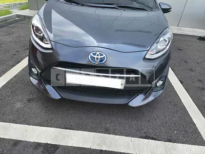 Photo 1 of 26: 2019 Toyota Prius C, VIN JTDKDTB3XK1629428 — Korean insurance auction