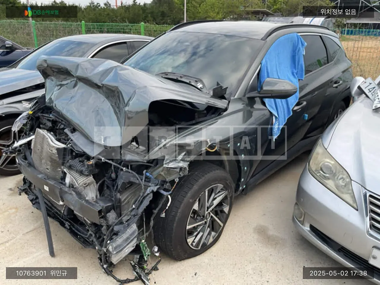 Photo 2 of 24: 2021 Hyundai Tucson, VIN KMHJC81BGMU068369 — Korean insurance auction