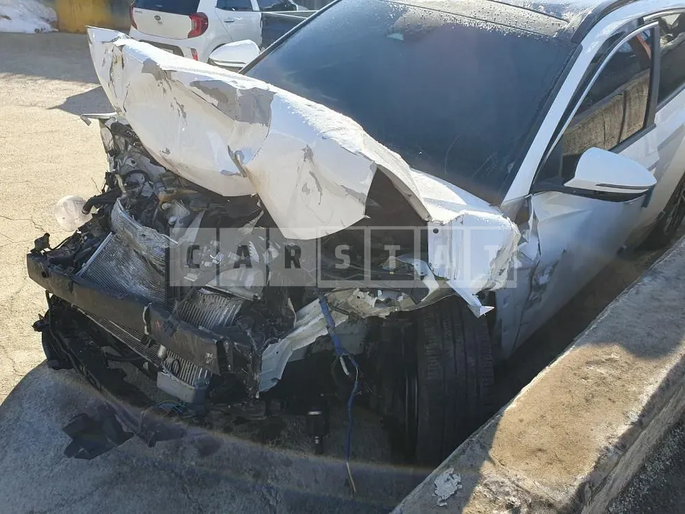 Photo 2 of 12: 2021 Hyundai Tucson, VIN KMHJC81CBMU008365 — Korean insurance auction