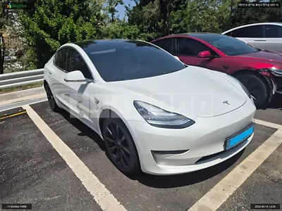 Photo 1 of 12: 2020 Tesla Model 3 Long Range, VIN 5YJ3E1EB1LF774472 — Korean insurance auction