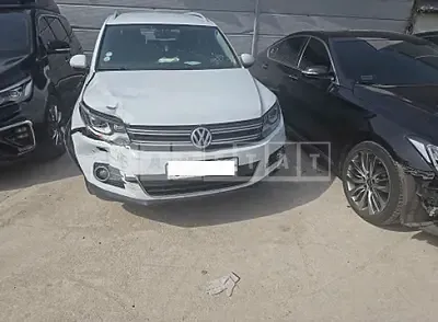 Photo 1 of 23: 2015 Volkswagen Tiguan 2.0 TDI Blue Motion, VIN WVGZZZ5NZFW510362 — Korean insurance auction
