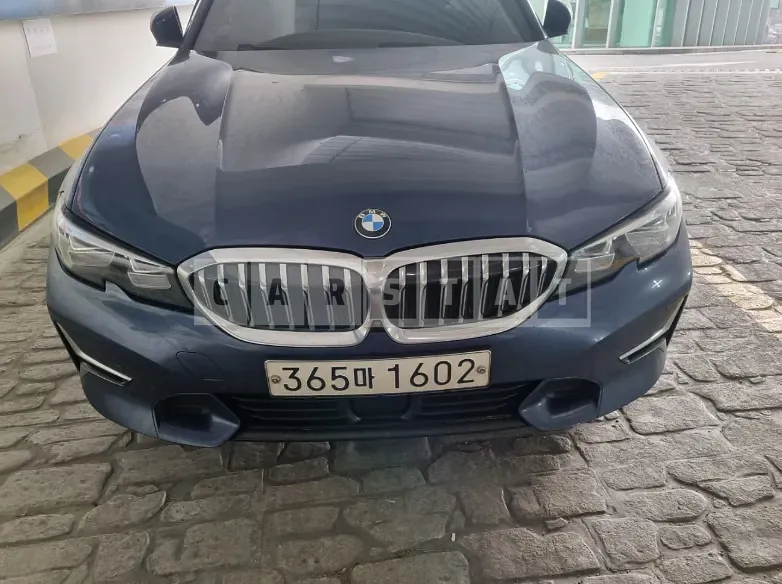 Photo 2 of 45: 2021 BMW 320i, VIN WBA5X5102MFK12671 — Korean insurance auction