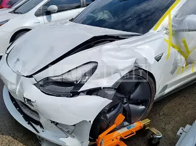 Photo 1 of 5: 2020 Tesla Model 3 Long Range, VIN 5YJ3E1EB9LF733510 — Korean insurance auction