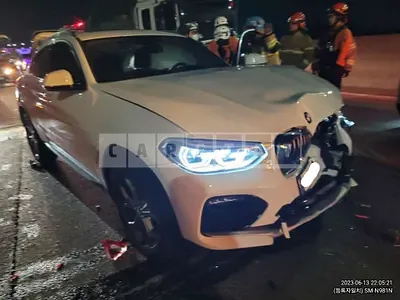 Photo 1 of 23: 2021 BMW X4 xDrive20i, VIN WBA2V910XM9G20742 — Korean insurance auction