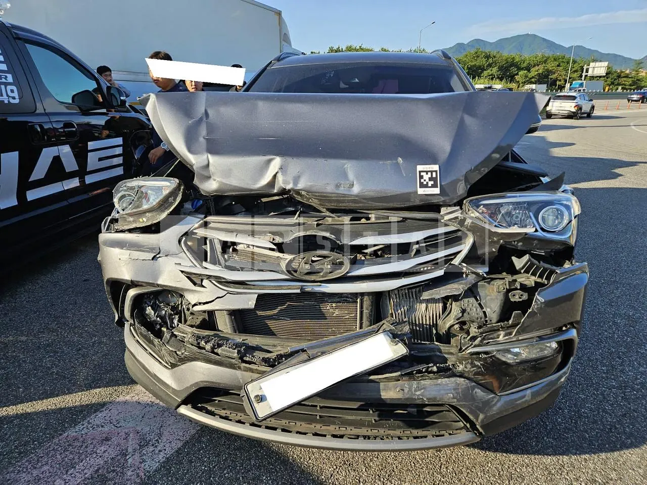 Photo 2 of 7: 2016 Hyundai Santa Fe, VIN KMHSW81UBGU671267 — Korean insurance auction