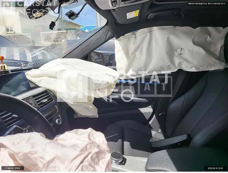 Photo 2 of 9: 2018 BMW 320i, VIN WBA8A9100JAH11809 — Korean insurance auction