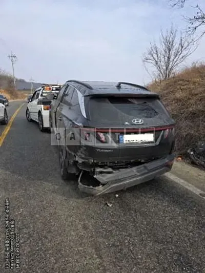 Photo 1 of 12: 2021 Hyundai Tucson, VIN KMHJE81BGMU010086 — Korean insurance auction