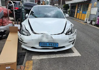 Photo 1 of 13: 2020 Tesla Model 3 Long Range, VIN 5YJ3E1EB1LF585661 — Korean insurance auction