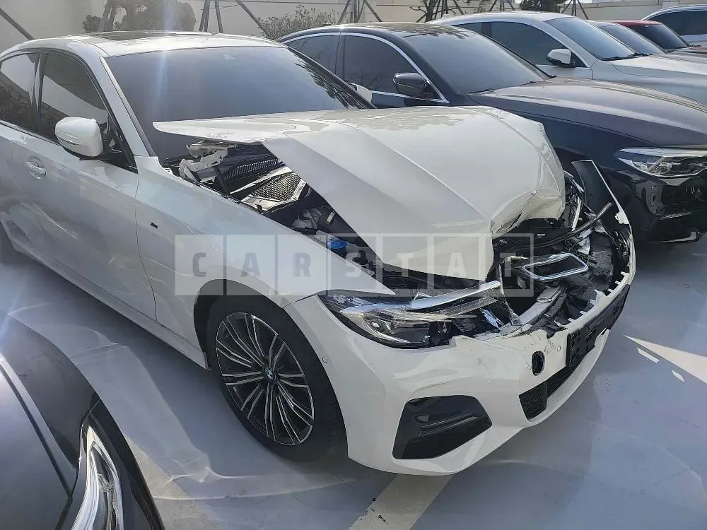 Photo 2 of 9: 2022 BMW 320i, VIN WBA5X5103NFM38350 — Korean insurance auction