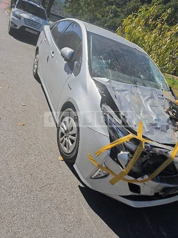 Photo 2 of 7: 2016 Toyota Prius, VIN JTDKBRFU5G3518857 — Korean insurance auction