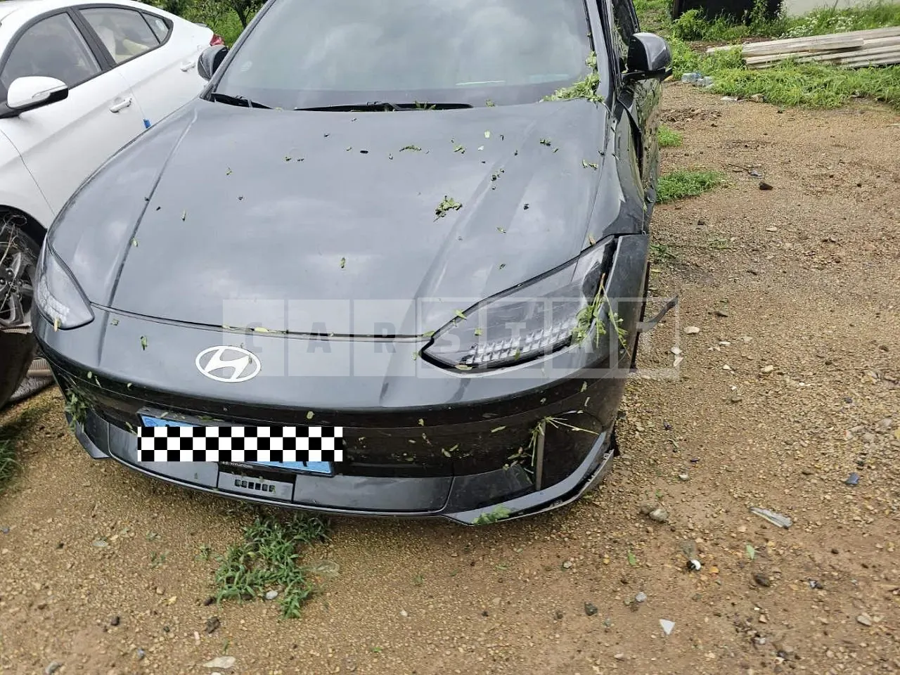 Photo 2 of 25: 2023 Hyundai IONIQ 6, VIN KMHM341AFPA000648 — Korean insurance auction
