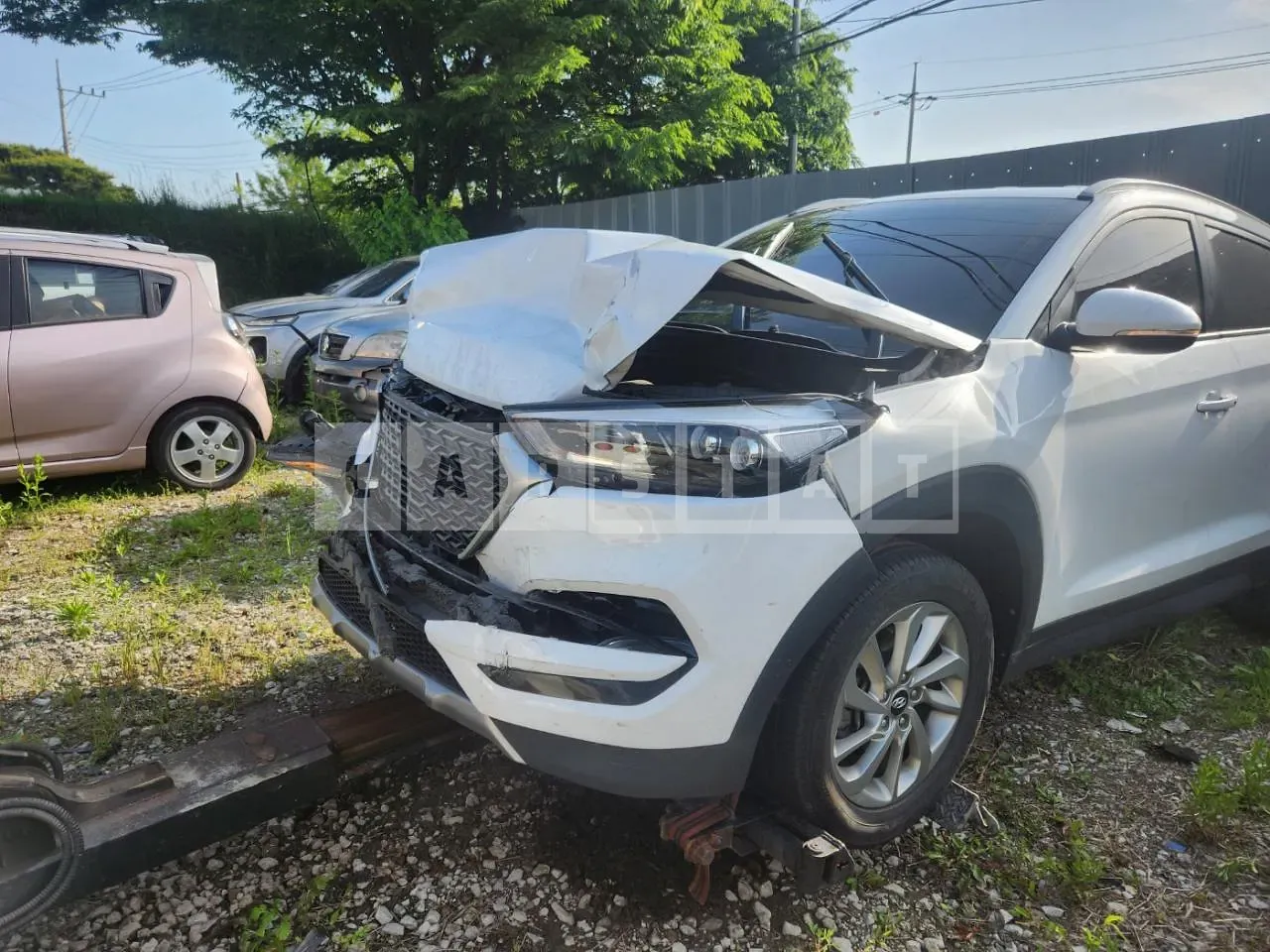 Photo 2 of 9: 2017 Hyundai Tucson, VIN KMHJ3815GHU376667 — Korean insurance auction