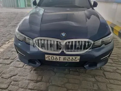 Photo 1 of 9: 2021 BMW 320i, VIN WBA5X5102MFK12671 — Korean insurance auction