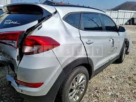 Photo 2 of 14: 2016 Hyundai Tucson, VIN KMHJ3815GGU007468 — Korean insurance auction