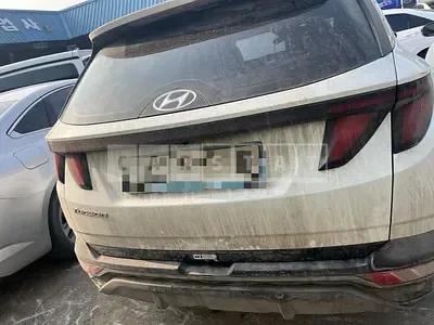 Photo 1 of 11: 2021 Hyundai Tucson, VIN KMHJB81BGMU050341 — Korean insurance auction