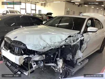 Photo 1 of 11: 2022 BMW 320i, VIN WBA5X5109NFM98777 — Korean insurance auction