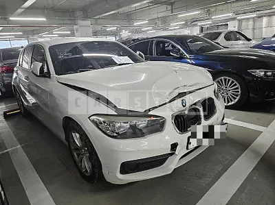 Photo 1 of 11: 2018 BMW 118d, VIN WBA1S5100J5L14372 — Korean insurance auction