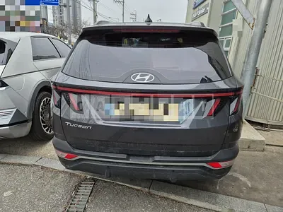 Photo 1 of 15: 2021 Hyundai Tucson, VIN KMHJC81BGMU067547 — Korean insurance auction