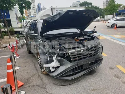 Photo 1 of 13: 2020 Hyundai Tucson Hybrid, VIN KMHJE811BMU002995 — Korean insurance auction
