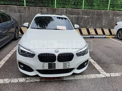 Photo 1 of 23: 2018 BMW 118d, VIN WBA1S5102J5L14258 — Korean insurance auction