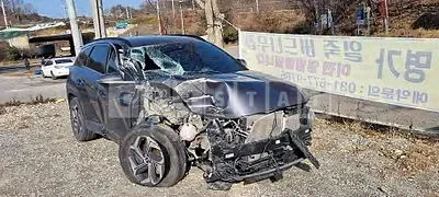 Photo 1 of 26: 2021 Hyundai Tucson, VIN KMHJE81BGMU006415 — Korean insurance auction
