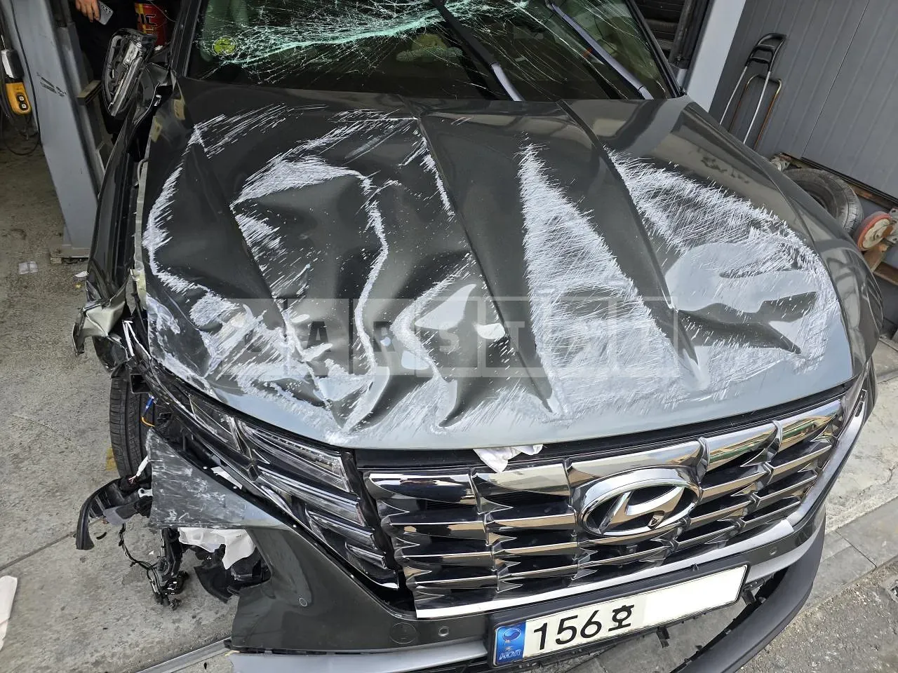 Photo 2 of 25: 2021 Hyundai Tucson, VIN KMHJC81BGMU044472 — Korean insurance auction