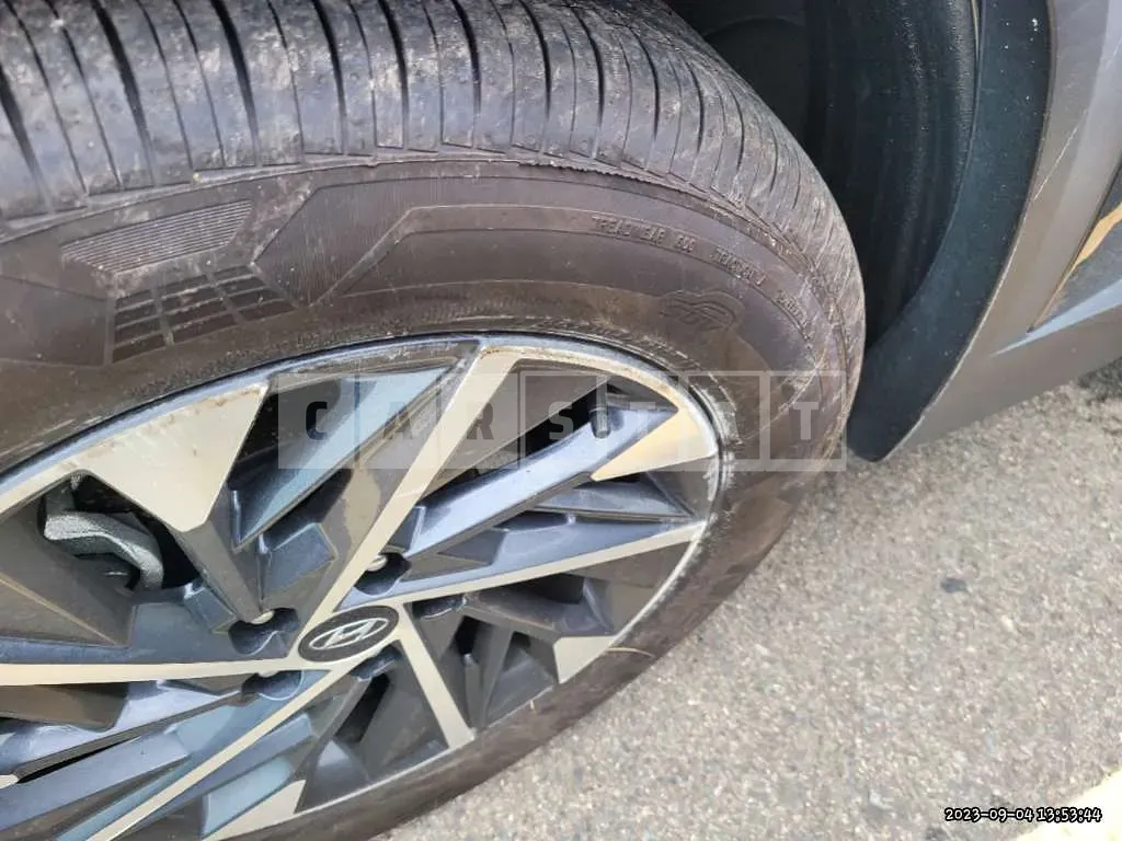 Photo 2 of 33: 2021 Hyundai Tucson, VIN KMHJC81BGMU030929 — Korean insurance auction