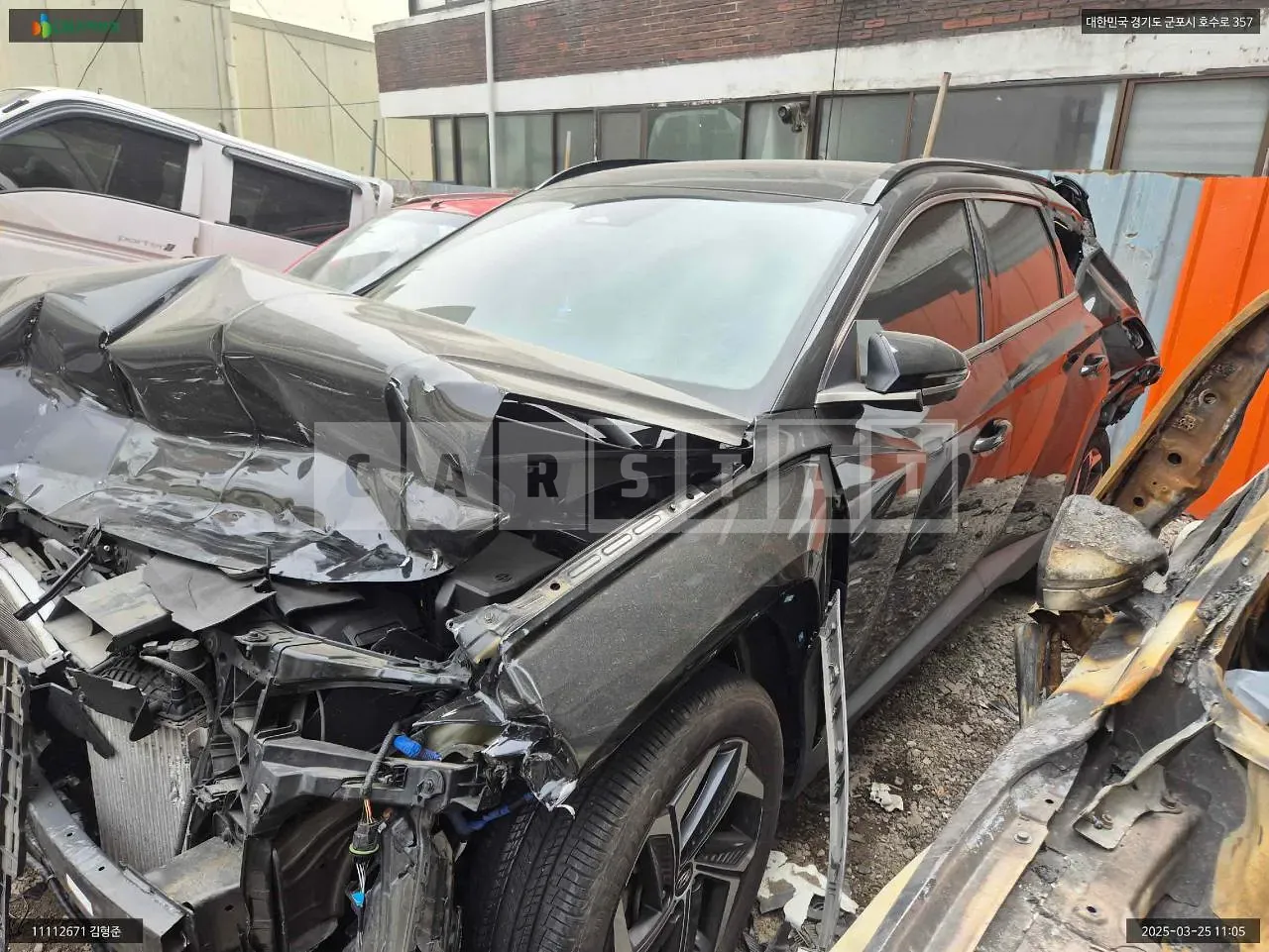Photo 2 of 26: 2021 Hyundai Tucson, VIN KMHJE81BGMU070662 — Korean insurance auction