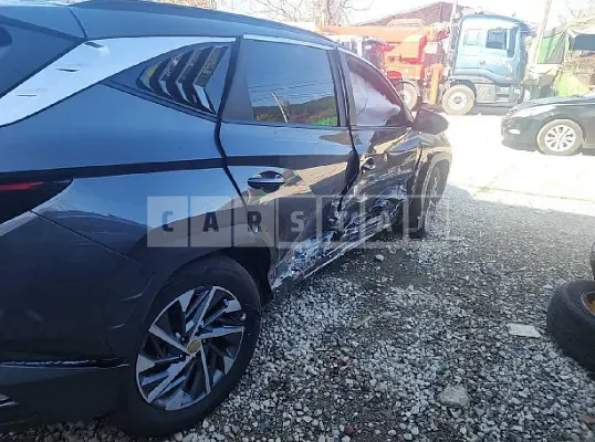 Photo 2 of 32: 2023 Hyundai Tucson, VIN KMHJC81BGPU223847 — Korean insurance auction