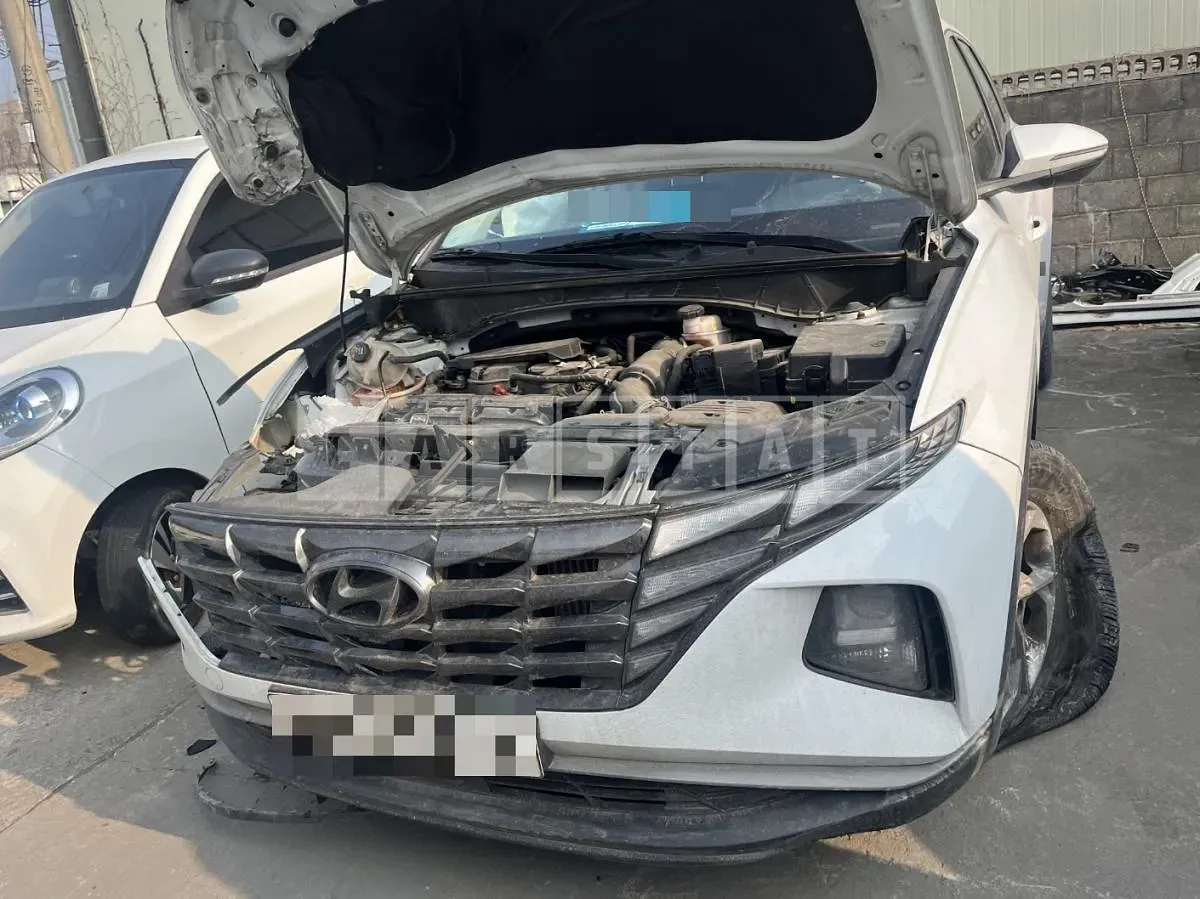 Photo 2 of 11: 2021 Hyundai Tucson, VIN KMHJB81BGMU050341 — Korean insurance auction