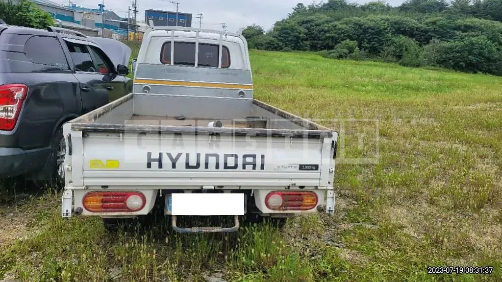 Photo 2 of 9: 2022 Hyundai Potter 2 Institutes, VIN KMFZCZ7NFNU041436 — Korean insurance auction