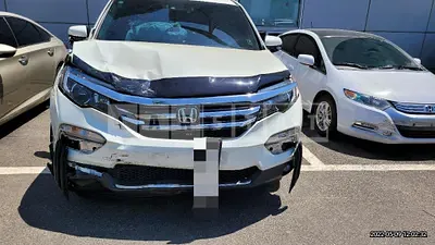 Photo 1 of 26: 2017 Honda Pilot, VIN 5FNYF6850HB200539 — Korean insurance auction