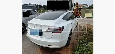 Photo 1 of 12: 2021 Tesla Model 3 Long Range, VIN 5YJ3E1EB2MF892595 — Korean insurance auction