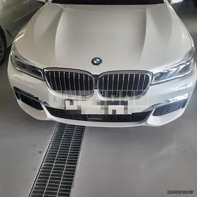 Photo 1 of 11: 2018 BMW 740Li xDrive, VIN WBA7E4102JGV27324 — Korean insurance auction