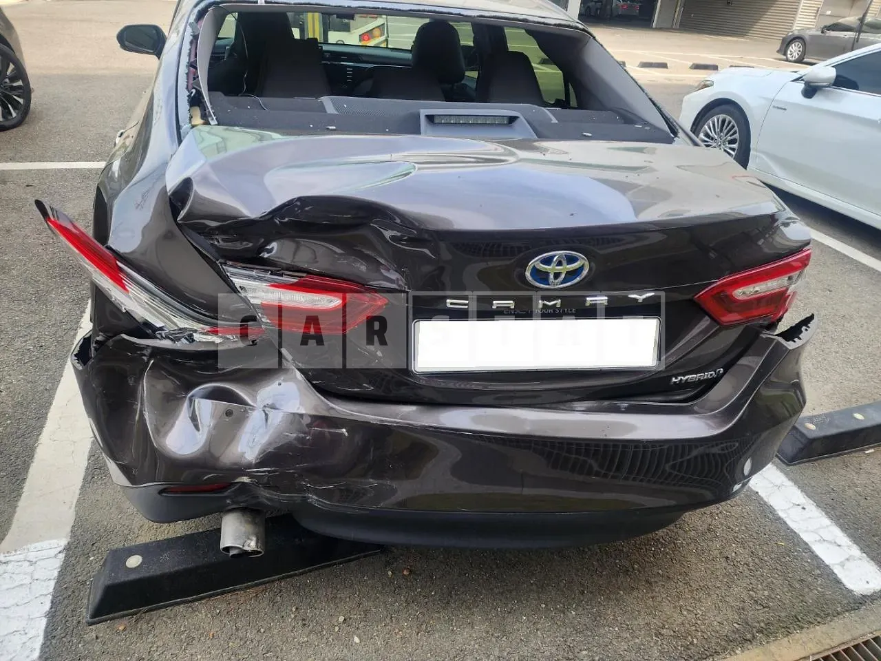 Photo 2 of 35: 2019 Toyota Camry Hybrid, VIN JTNB21HK8K3051211 — Korean insurance auction