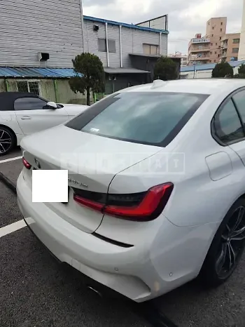 Photo 2 of 8: 2021 BMW 330e, VIN WBA5P7101MFL16421 — Korean insurance auction