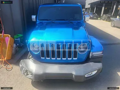Photo 1 of 18: 2022 Jeep Wrangler Sahara 4XE, VIN 1C4JJXP60NW147489 — Korean insurance auction