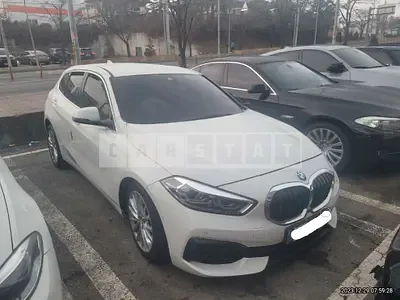 Photo 1 of 17: 2021 BMW 118d, VIN WBA7M9103M7H50396 — Korean insurance auction