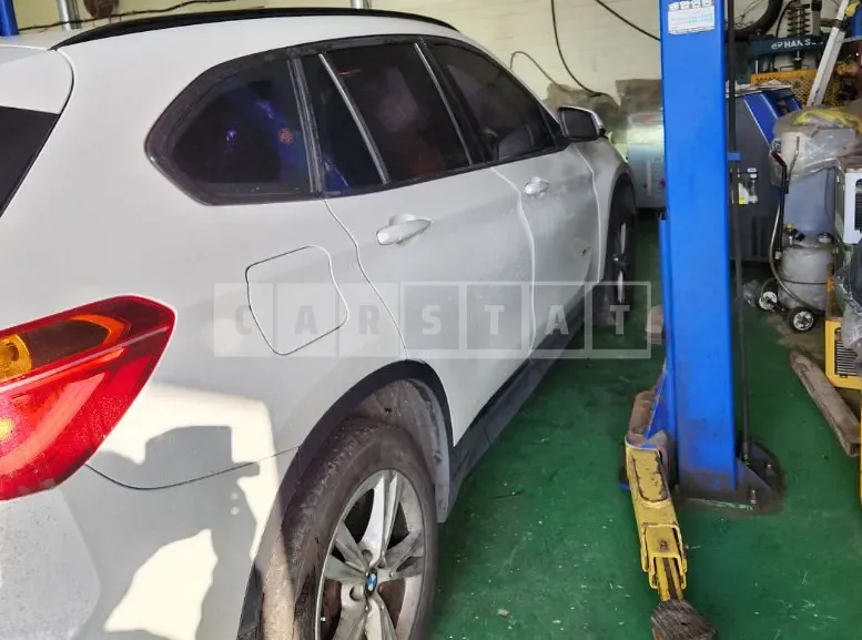 Photo 2 of 12: 2016 BMW X1 xDrive18d, VIN WBAHT9101G5F16684 — Korean insurance auction