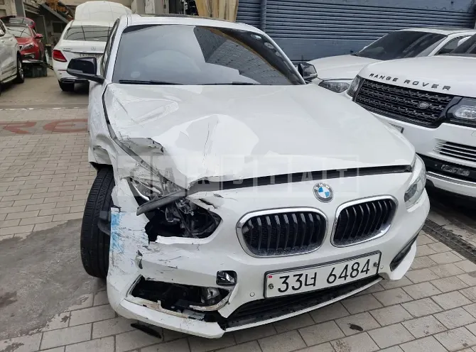 Photo 2 of 14: 2017 BMW 118d, VIN WBA1S5100HV809844 — Korean insurance auction