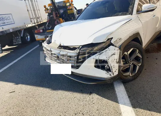 Photo 2 of 14: 2021 Hyundai Tucson, VIN KMHJE81BGMU003674 — Korean insurance auction