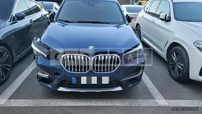 Photo 1 of 12: 2021 BMW X1 xDrive20i, VIN WBA11DG0XM5S89697 — Korean insurance auction