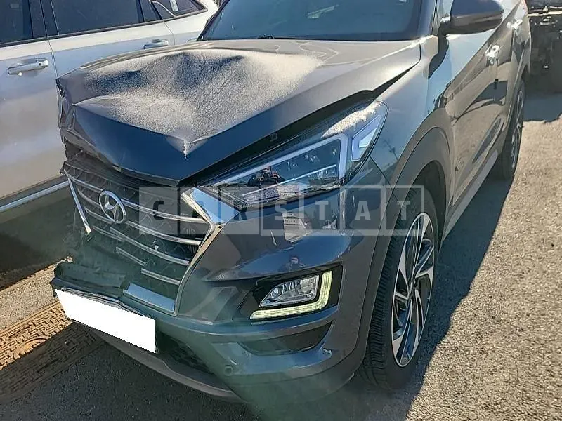 Photo 2 of 31: 2019 Hyundai Tucson, VIN KMHJ5817GKU023576 — Korean insurance auction