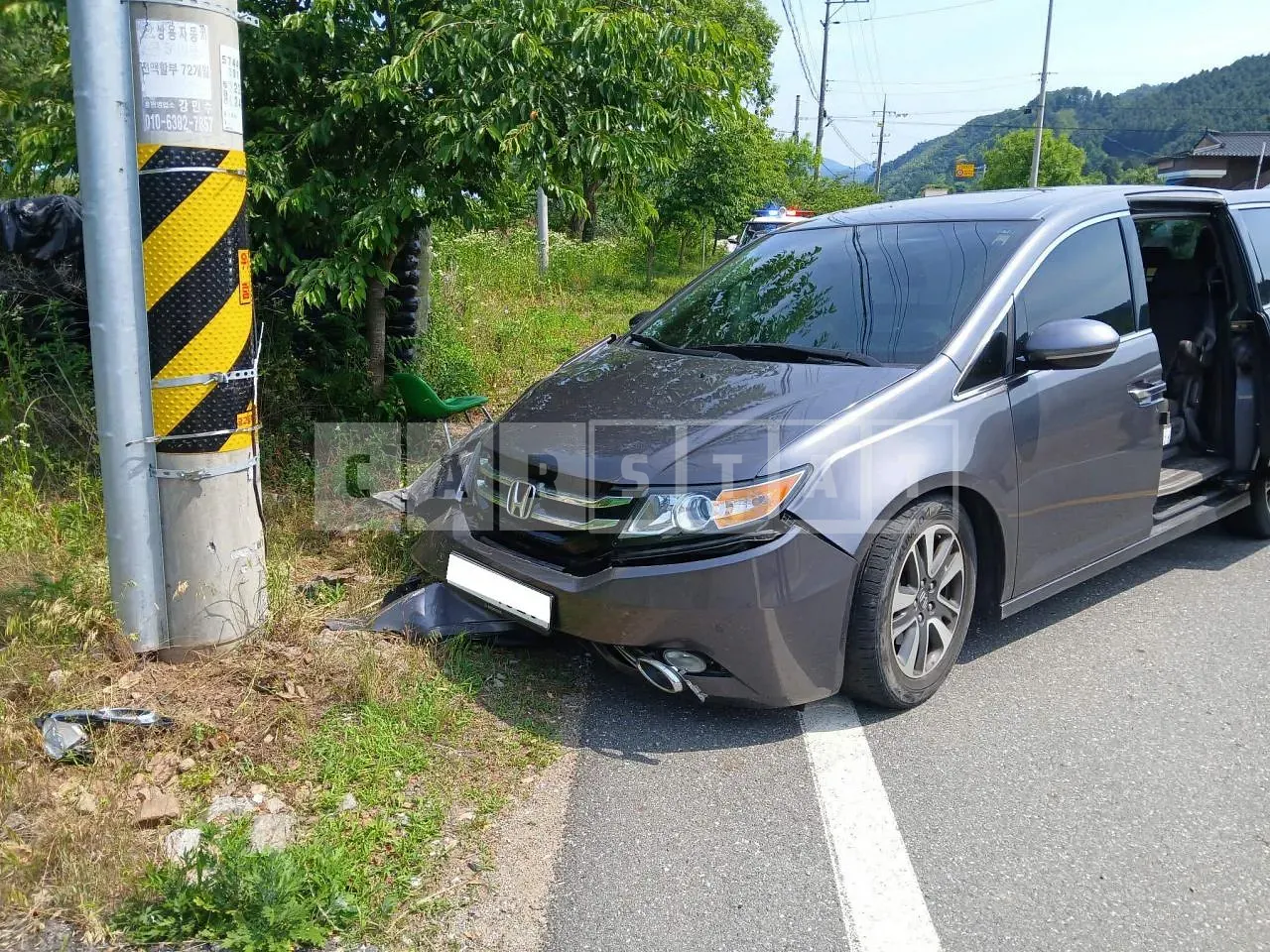 Photo 2 of 4: 2015 Honda Odyssey, VIN 5KBRL5860FB601307 — Korean insurance auction
