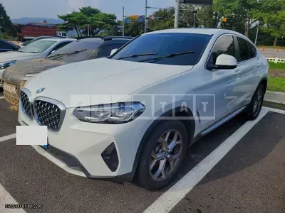 Photo 1 of 9: 2022 BMW X4 xDrive20i, VIN WBA21DT01N9J63314 — Korean insurance auction
