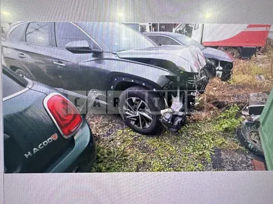 Photo 2 of 10: 2021 Hyundai Tucson, VIN KMHJC81BHMU048668 — Korean insurance auction