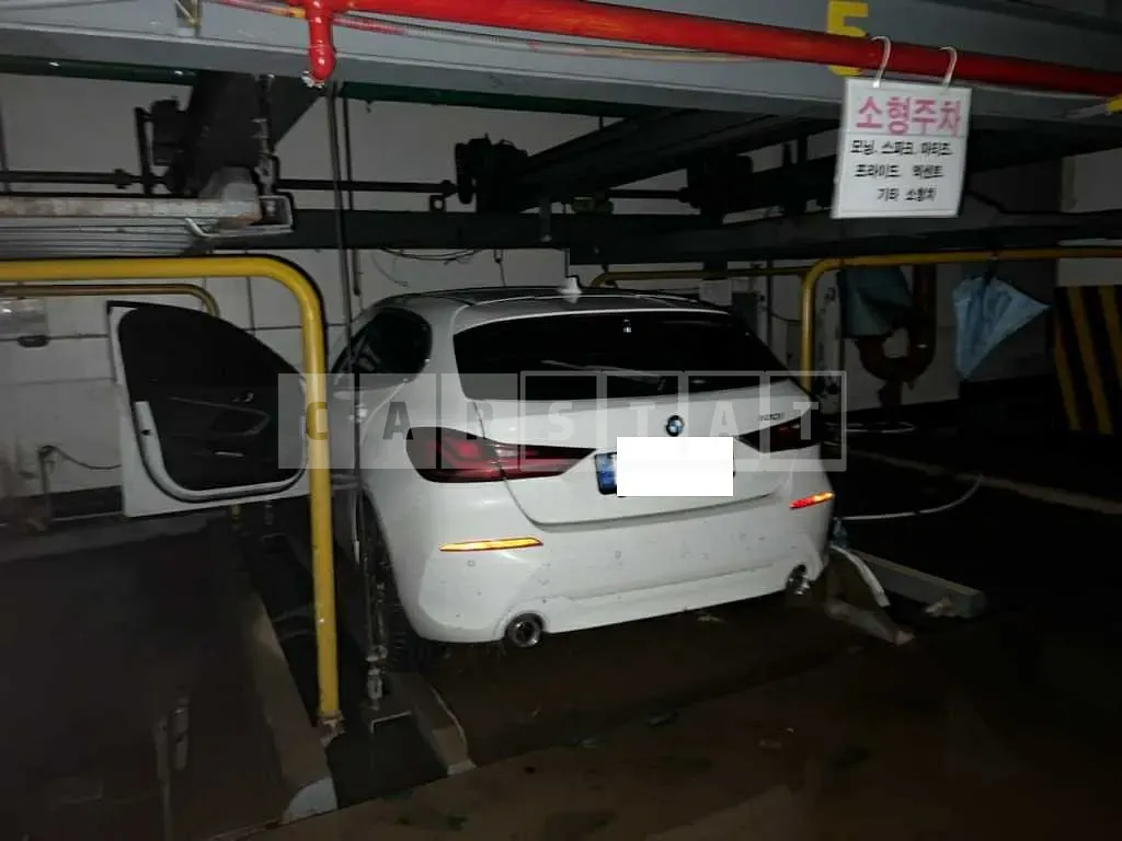 Photo 2 of 13: 2022 BMW 120i, VIN WBA7L7105N7K32893 — Korean insurance auction